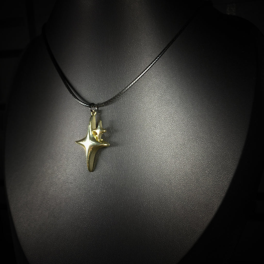 Collier Céleste Doré à Double Étoile